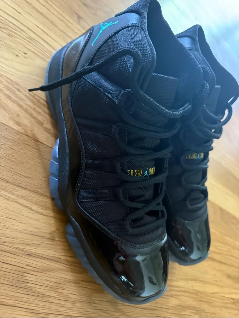 Jordan Retro 11 Athletic Shoes - Black with Teal Accents